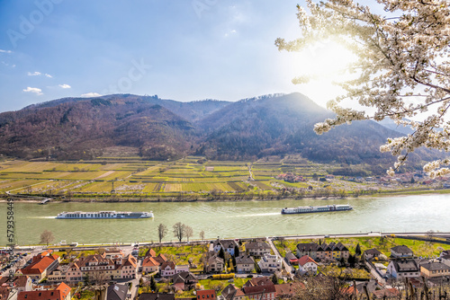 Photography Spitz village with ships on Danube river in Wachau valley (UNESCO) during spring