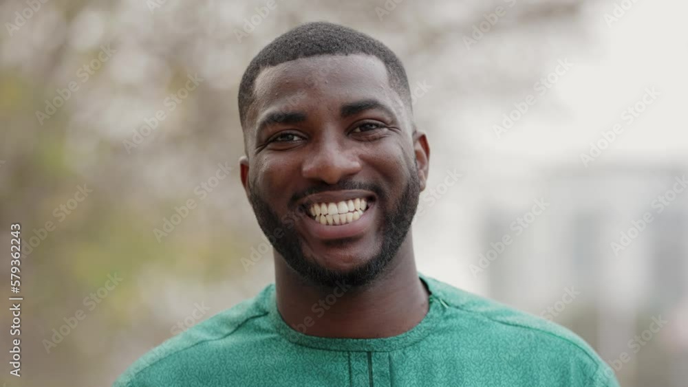 Portrait of Smiling Young African Man, Close Up. Portrait of Smiling Young African Man, Close Up.
