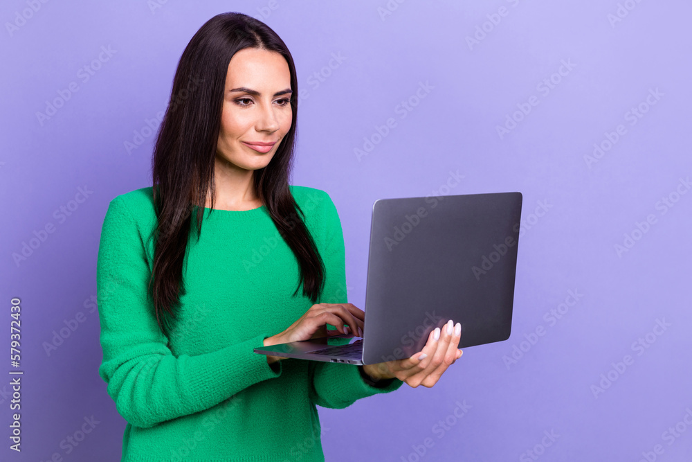 Fototapeta premium Photo of confident young business worker distance job lady wear stylish jumper hold netbook video call employee isolated on violet color background