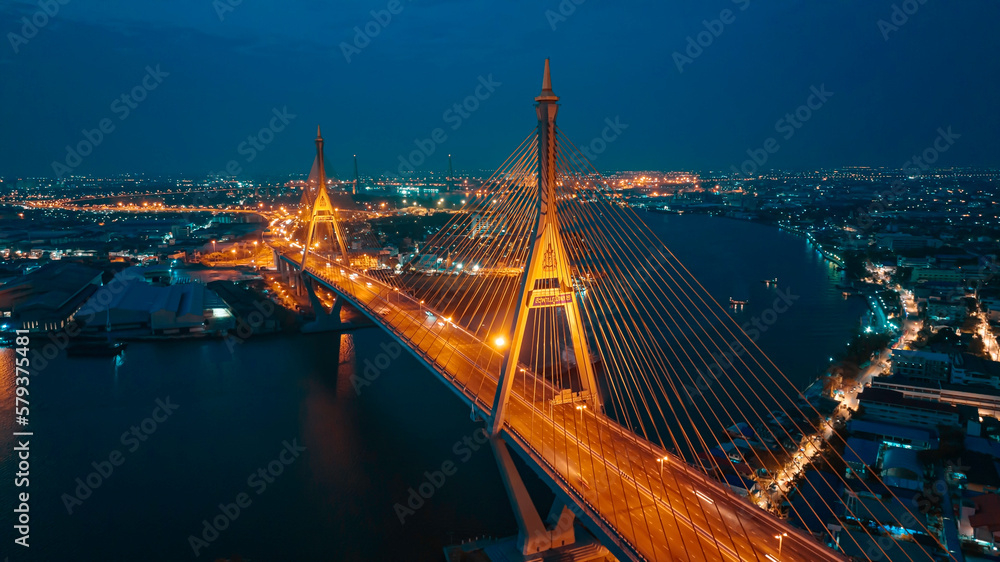 Fototapeta premium Bridge view from the top view of Thailand, Beautiful bridge, and river landscapes bird's eye view during sunset
