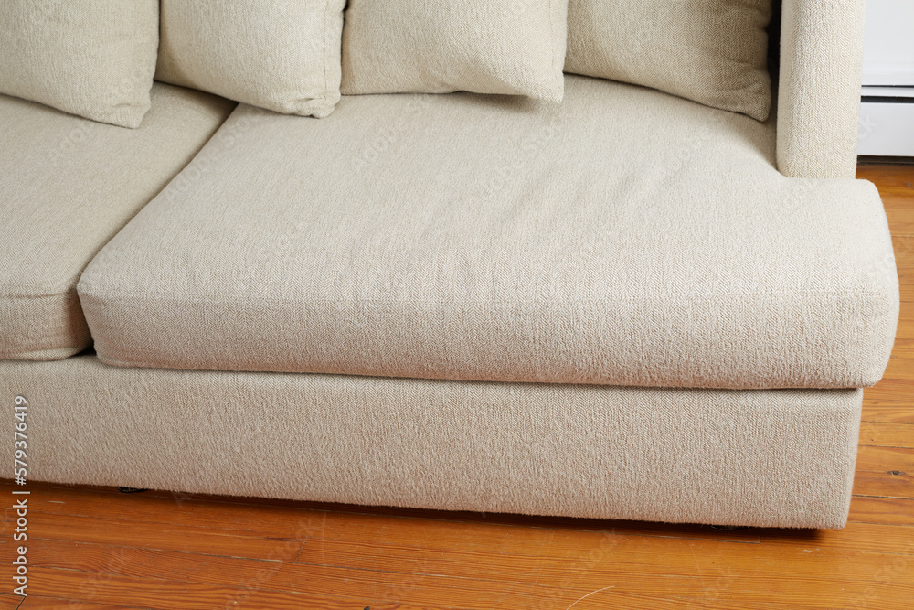 White textured Modern remake of a midcentury modern design sofa. Couch