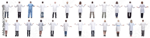 group of doctors standing with their backs isolated