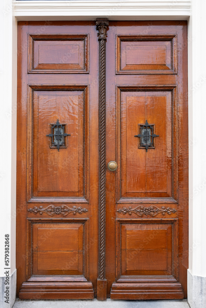 Luxuriously decorated old wooden door