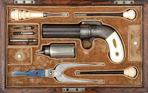 Cased ancient pistol Pepperbox from 19th century