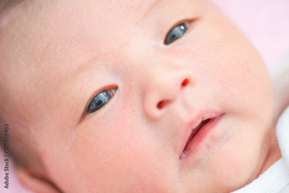 Portrait of a newborn Asian baby girl sleep on the bed , cute Fat baby 5 day. Portrait of a newborn Asian baby girl sleep on the bed , cute Fat baby 5 day.