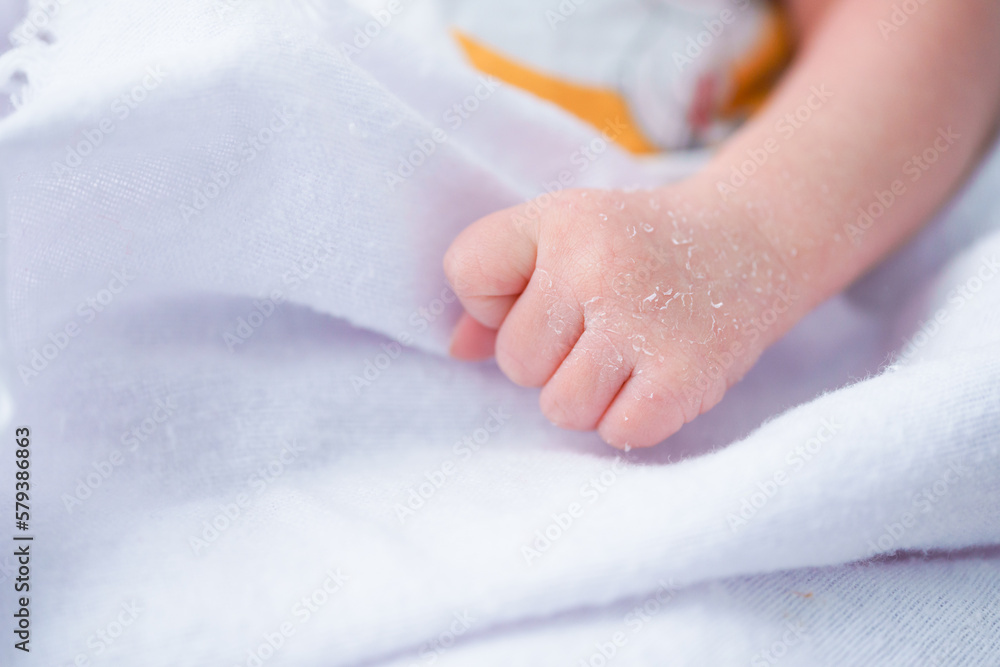 Portrait of a newborn Asian baby girl sleep on the bed , cute Fat baby 5 day. Portrait of a newborn Asian baby girl sleep on the bed , cute Fat baby 5 day.