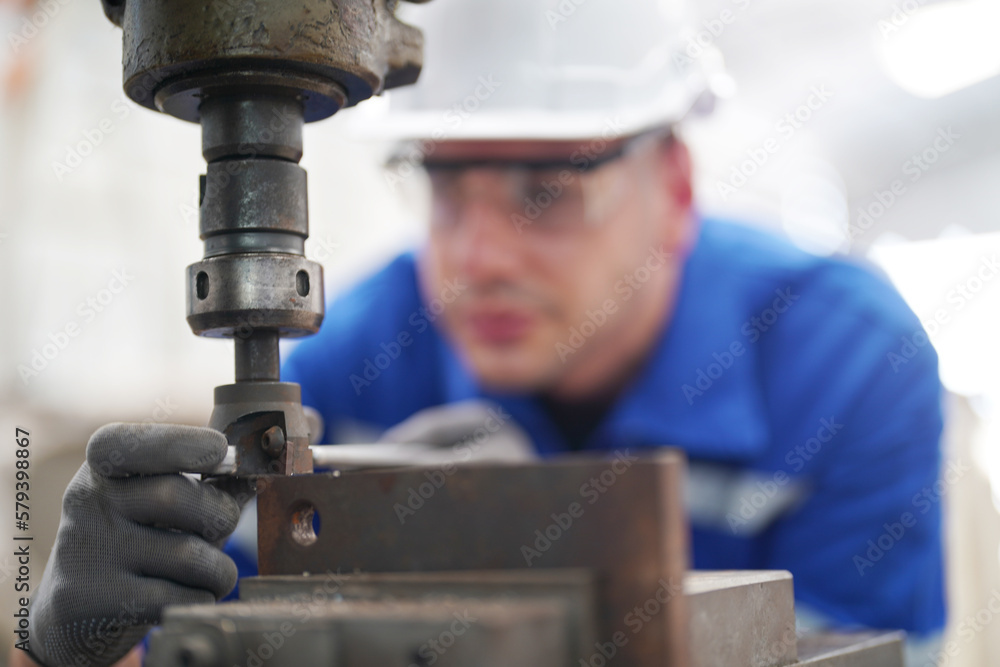 worker using a drill worker using a drill