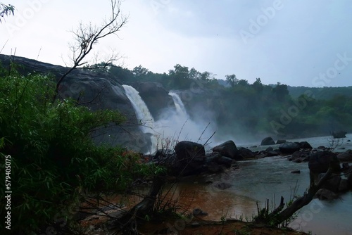 Athirappilly waterfall or Bahubali waterfall south India, Kerala, in a rainy day photo