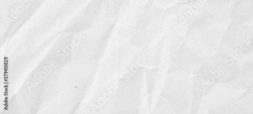 Fototapeta Naklejka Na Ścianę i Meble -  Abstract white crumpled and creased recycle paper texture background