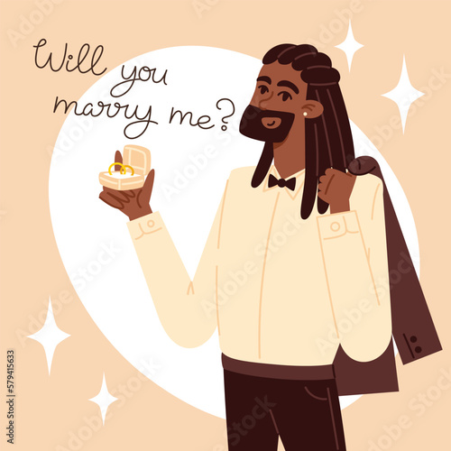 Young man in a suit making a wedding proposal