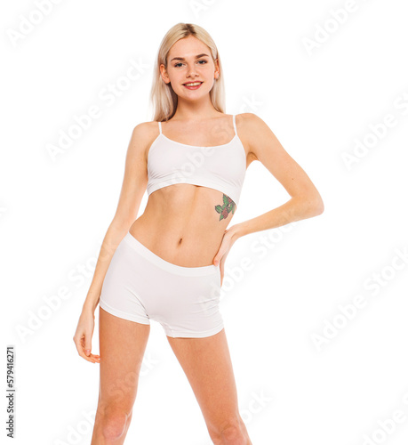 Young beautiful blonde woman in white sports underwear