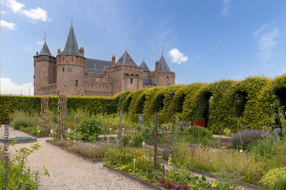 Medieval Dutch castle - Muiderslot, with the herb garden in the foreground.