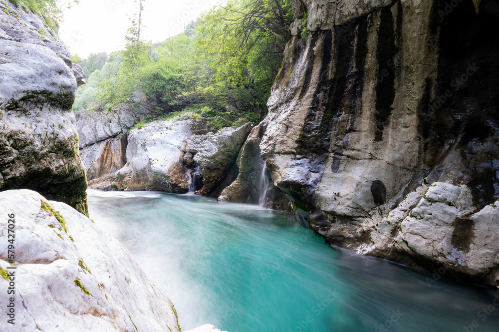 Blurred image of a beautiful soca river in slovenia Blurred image of a beautiful soca river in slovenia