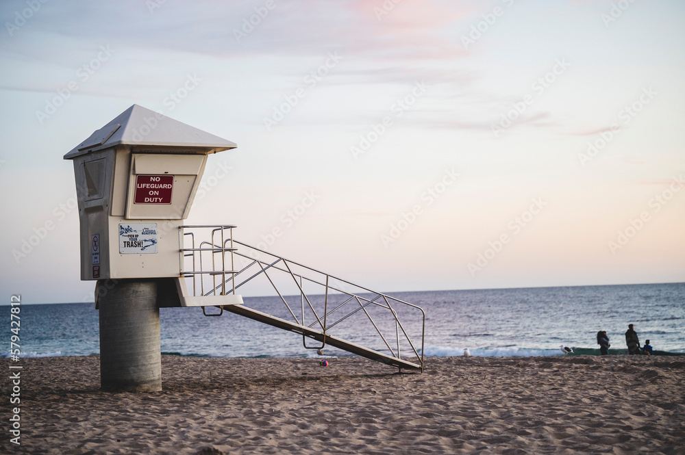 Vertical shot of a metallic lifeguard tower on the beach