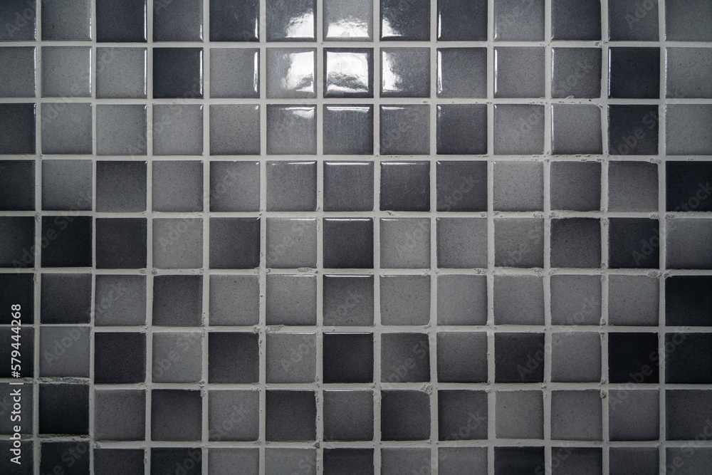 Light gray and dark gray mosaic tiles wall Light gray and dark gray mosaic tiles wall