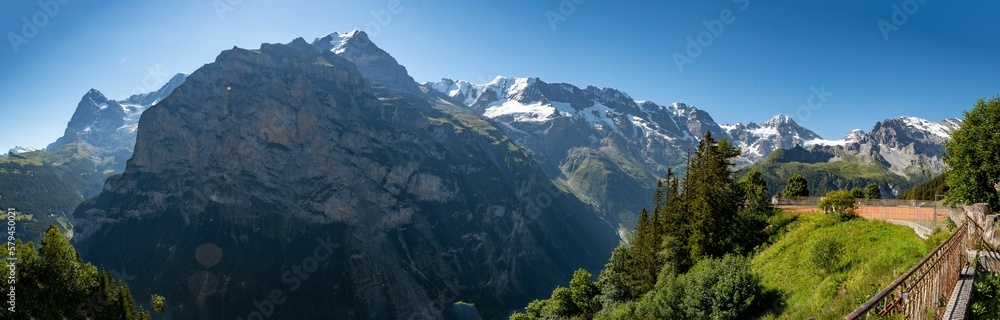 Panoramic shot of the landscape with mountains on a sunny day