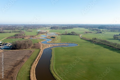 Aerial view of a curvy river near the village of Almen in the Netherlands.