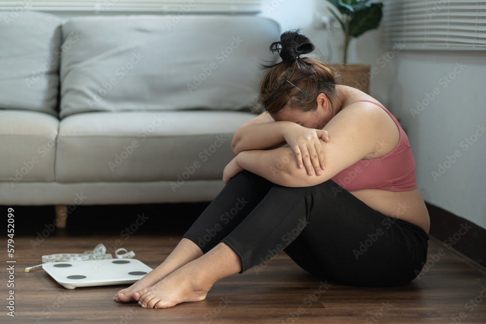Depressed sadness overweight woman failure in weight loss..