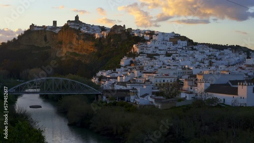 Aerial view of Guadalete river and white houses of Arcos de la Frontera town in Andalusia, Spain photo