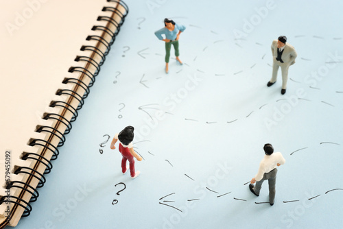 Concept image of people thinking about solving a problem and looking for a right way © tomertu