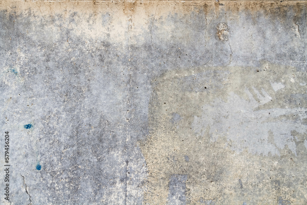 Dirty wall texture. Grunge concrete texture. Cracks and chips on the wall.