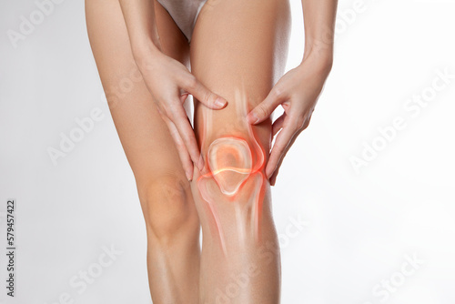 Knee pain, meniscus inflamed, human leg medically accurate representation of an arthritic knee joint. Persistent, sharp discomfort in the knee joint, accompanied by swelling and stiffness	 photo