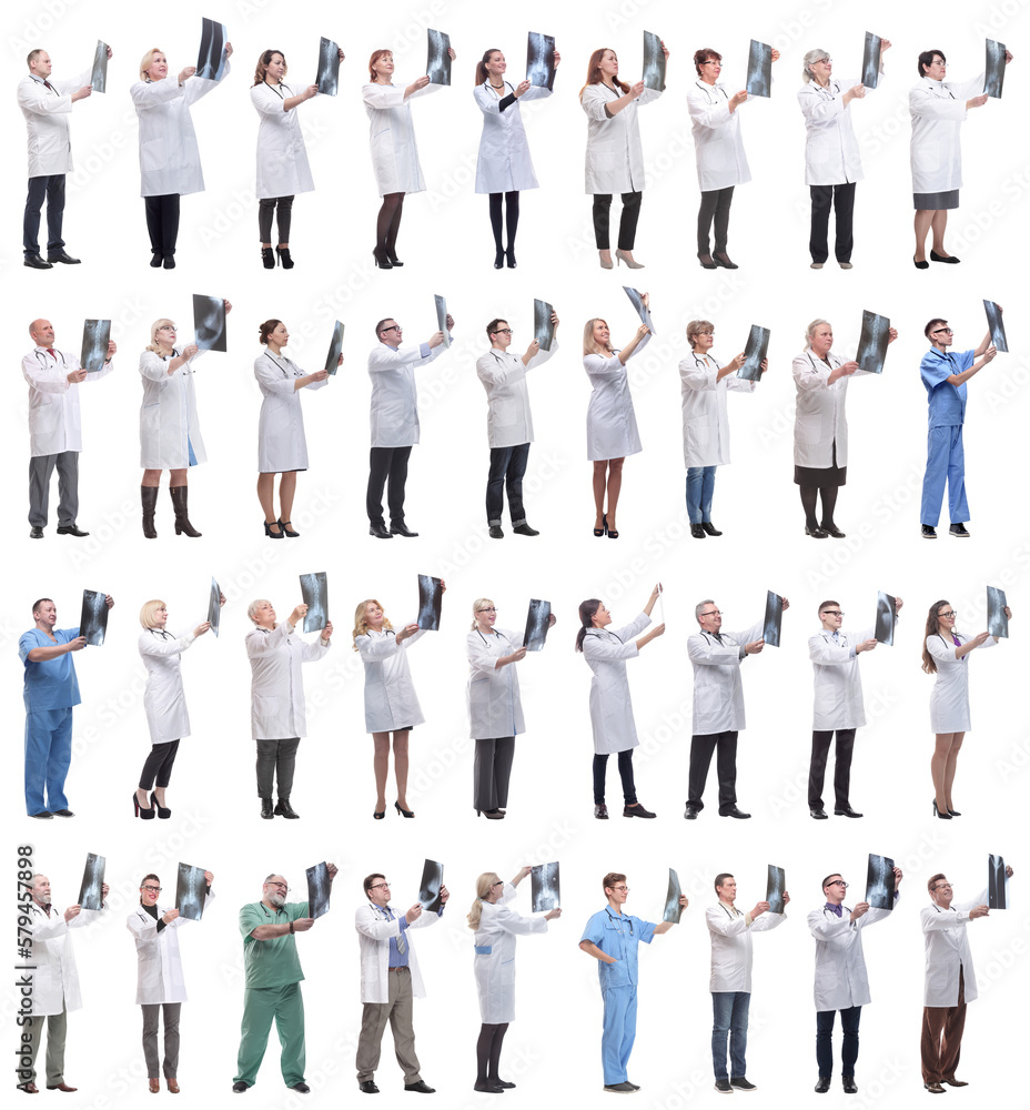 group of doctors holding x-ray isolated on white group of doctors holding x-ray isolated on white