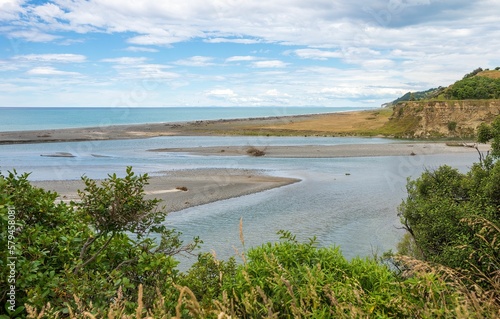 Wallpaper Mural Pebbles on Hurunui River Mouth under blue cloudy sky in South Island, New Zealand Torontodigital.ca