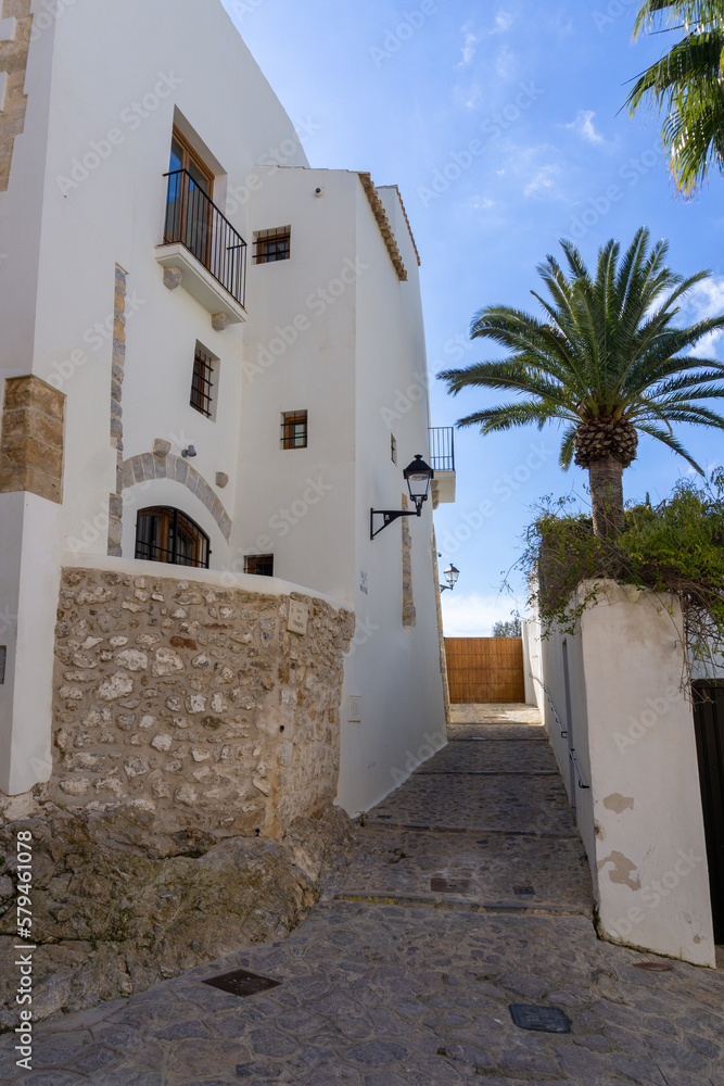 Streets of the old town of Ibiza, with the typical white houses of the island, on a sunny day and without tourists