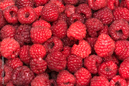 Fresh red raspberries close-up.Beautiful harvest.