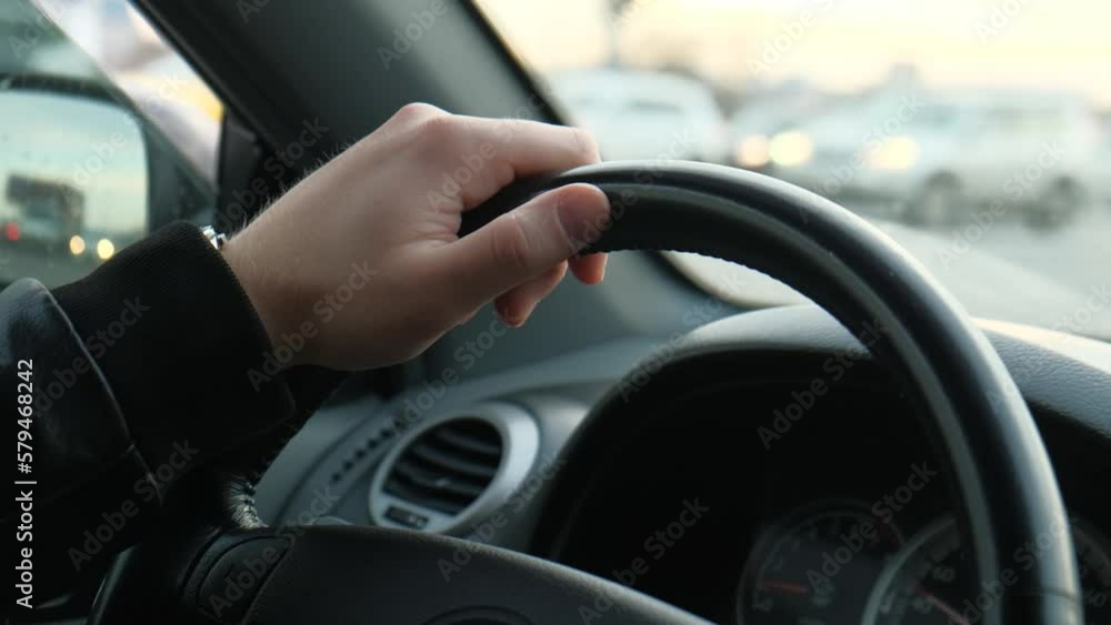 custom made wallpaper toronto digitalThe driver's hand on the steering wheel of the car while driving, closeup