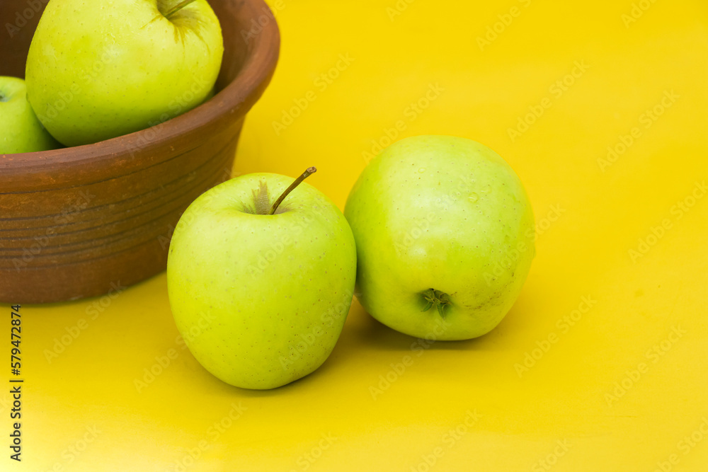 apple isolated on yellow background. apple isolated on yellow background.