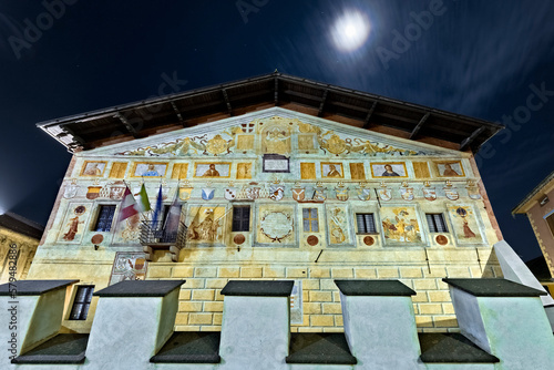 The frescoed facade of the palace of the Magnificent Community of Fiemme di Cavalese. Fiemme Valley, Trentino, Italy. photo