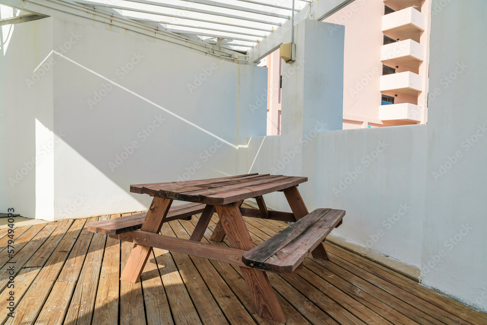 Destin, Florida Table and chairs on a wood flooring of a shed with