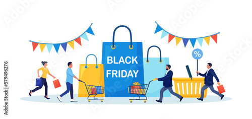 Black Friday Sale Event. People Buy on Big Discount Sales. Customers Running with Shopping Bags, Trolley, Cart with Gift Boxes and Big Packages on Background. E-commerce and Online Shopping