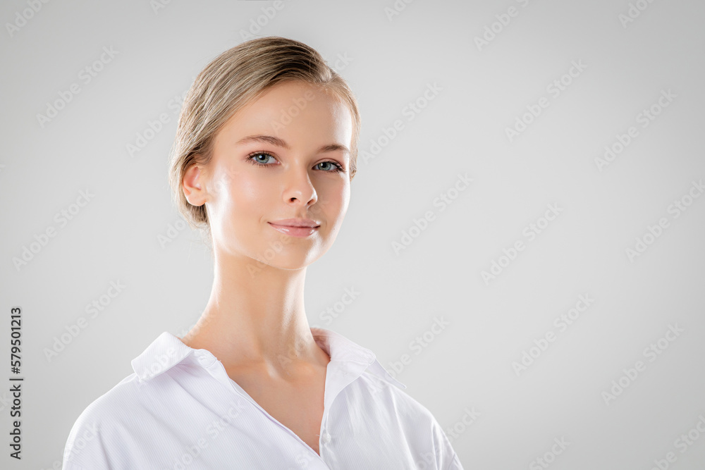 Beauty Woman Face Skin Care. Smiling Model with Natural Make up and Hands on Cheeks looking at camera over White. Women Manicure and Facial Treatment Cosmetics. Spa Massage and Face Lift Cosmetology Beauty Woman Face Skin Care. Smiling Model with Natural Make up and Hands on Cheeks looking at camera over White. Women Manicure and Facial Treatment Cosmetics. Spa Massage and Face Lift Cosmetology
