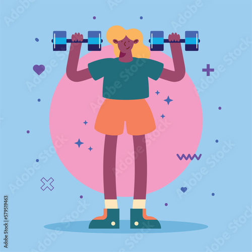 young woman lifting dumbbells