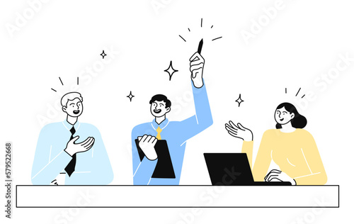 Employees sitting at a desk in the office
