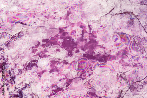 Lepidolite (rose mica). macro detail texture background. close-up raw rough unpolished semi-precious gemstone photo