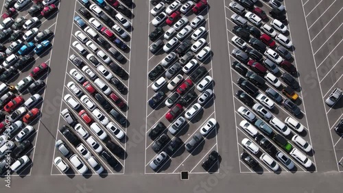 Aerial view of a parking lot full of used cars. photo