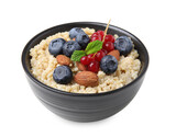 Bowl of delicious cooked quinoa with almonds, cranberries and blueberries isolated on white
