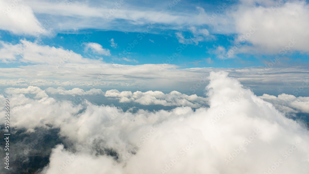 Blue sky with clouds over the mountains. View over the clouds. Sri Lanka, Lipton's Seat. Blue sky with clouds over the mountains. View over the clouds. Sri Lanka, Lipton's Seat.
