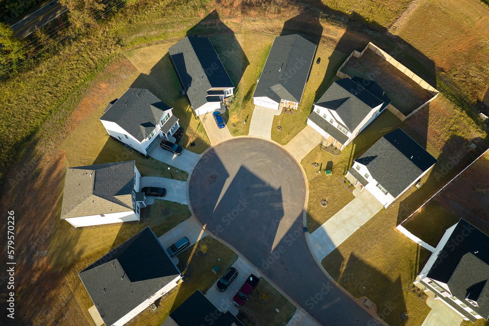 Aerial view of cul de sac at neighbourhood road dead end with densely