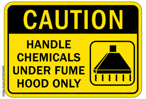 Hazardous fumes sign and labels handle chemicals under fume hood only
