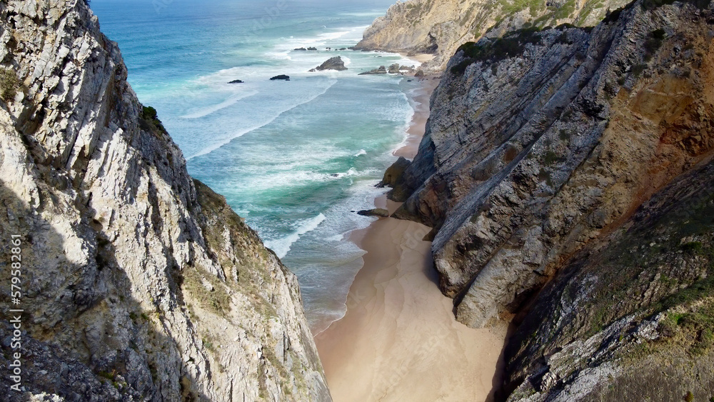 Obraz premium Praia da Adraga beach and rock cliffs of Portuguese coast