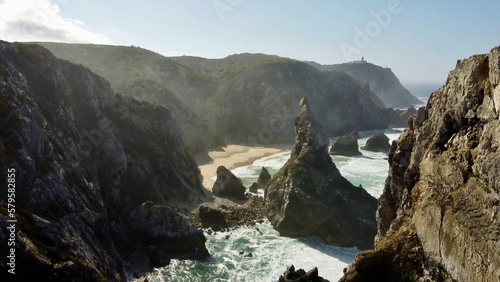 Praia da Ursa beach and rock cliffs of Portugal from above