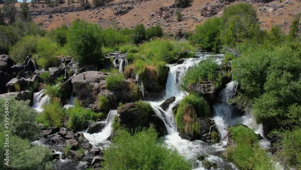 Multi-tiered waterfall in desert landscape. Multi-tiered waterfall in desert landscape.