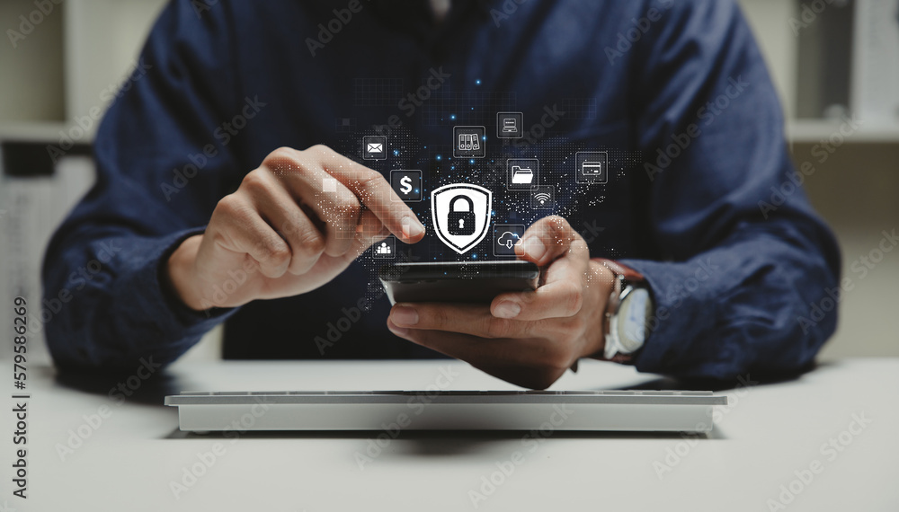 Cyber security and network protection, Private key concept, Hand of young business using smart phone with security icon for business and internet. Cyber security and network protection, Private key concept, Hand of young business using smart phone with security icon for business and internet.