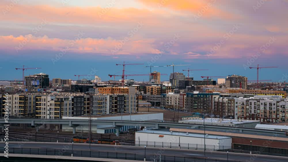 Construction cranes at River North Art District in Denver; sunset time lapse Construction cranes at River North Art District in Denver; sunset time lapse