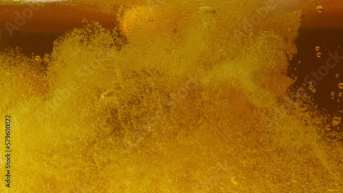 pour beer into a glass of beer, beer, soda, slow motion